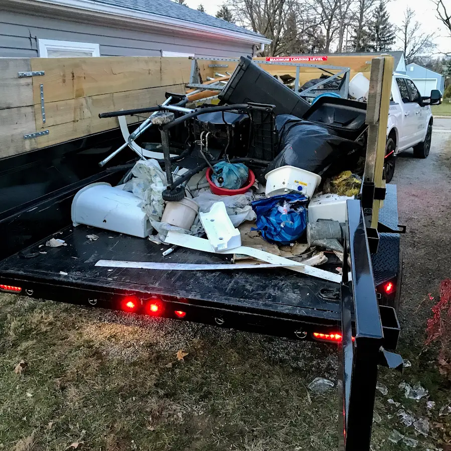 Roll-off dumpster delivered to a residential driveway in Nicholasville